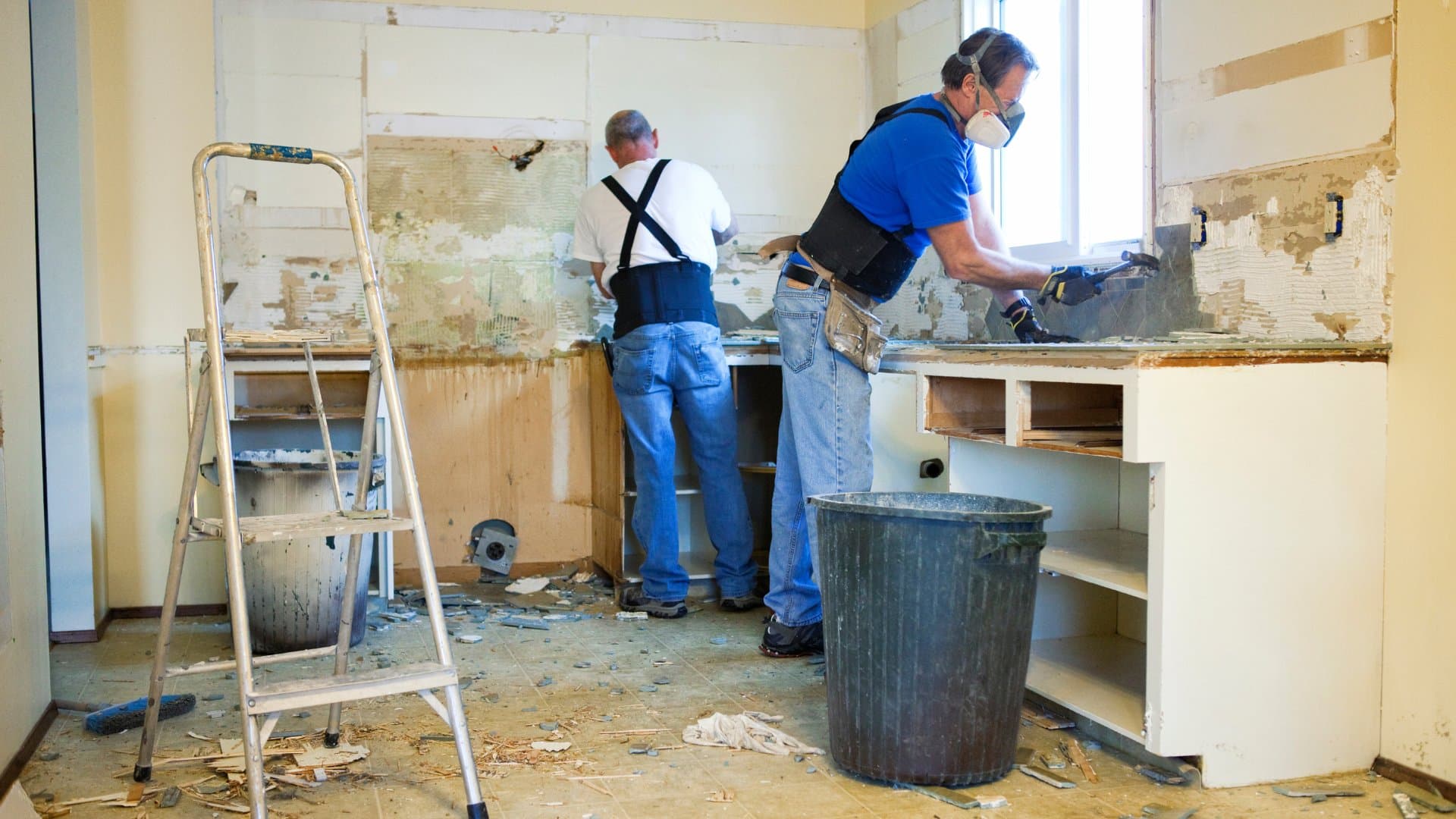 Professional kitchen cabinet installation during renovation